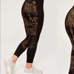 Lole  Burst Black and Gold Print Ankle Leggings. Size Small. EUC Photo 1