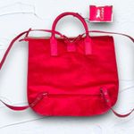 Juicy Couture ā
(NWT) Dark Pink Velvet Mini Backpack / Purse with Cute Bow ā
Photo 3