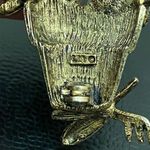 LIA Signed Pot of Flowers with Garden Tools Gold Photo 6