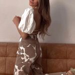 12th Tribe Cow Print Denim Pants Photo 1