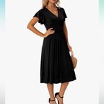 GRECERELLE Women Casual Ruffle Short Sleeve Wrap V Photo 1