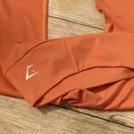 Gymshark  orange crop leggings size medium Photo 5