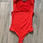 Dynamite  red bodysuit Photo 0