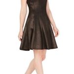 Julia Jordan black and gold split neck flare skater dress. Size 10. Photo 0