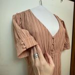 All in Favor size medium mid length dress. Zips up the back. Faux buttons. Lined Photo 1