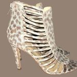 Ivanka Trump  gold and taupe leopard print strappy ankle boots! Photo 0