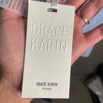 Grace Karin NWT Womens Light Blue Tie Front Bell Sleeve Peplum Top Size 2XL Photo 5