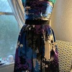 “Strapless dress with an abstract print in shades of blue, purple, and black. Blue Size 4 Photo 0
