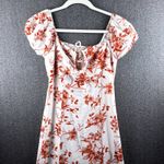 Women's XS White Floral Milkmaid Cap Sleeve Dress Tie Front Smocked Midi Dress Photo 1
