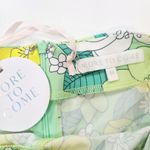 More to Come Sandy Flared Jumpsuit in Green Floral Medium Yellow Photo 6