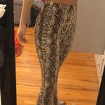 Princess Polly Snakeskin flare pants  Photo 0