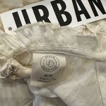 Urban Outfitters  Cream Eyelet Ruffle Mini Dress - Size Medium NWT Photo 6