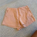 Lululemon  high rise softstreme 2.5” shorts orange, pastel Photo 1