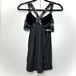 Lululemon  Rest Less Tank in Heathered Black and Flowabunga Black Angel Wing. Photo 5