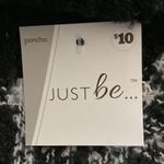 Me Too Black/White Ponco with fringe on edges and solid black cow neck. Photo 5