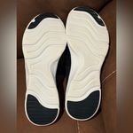 Skechers  Men's Black and White Slip-On Loafers Photo 6