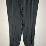 The Kooples SPORT black satin joggers with zippered pockets size medium Photo 2