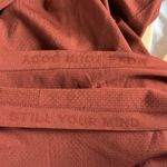 Lululemon rust colored Run Swiftly Long Sleeve Top. Size 6 Photo 4