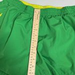 Nike  Women’s Size Large Green and Yellow Lightweight Performance Shorts Photo 7