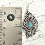 Silver tone feather and faux turquoise earrings Photo 3