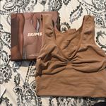 SKIMS SEAMLESS THONG BODYSUIT Photo 3