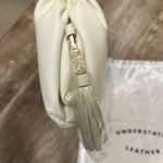 Understated Leather Cream Crescent Clutch Textured Wristlet Photo 4