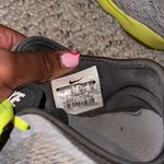 Nike Gray with Neon Yellow Accents Running Shoes Photo 1