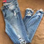 Skinny Jeans Ripped Knee Blue Photo 0