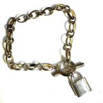 Silver tone locket charm bracelet Photo 0
