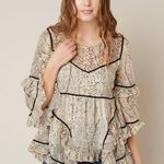 Miss Me Ruffle Printed Top Photo 0