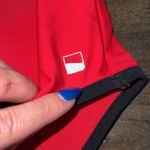 NWOT Swimwear Long Sleeve Open Back One Piece Photo 1