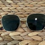Revolve Aire Sunglasses  Photo 0