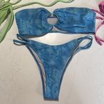 A lot of 5 sets of string bikinis. Tags have all been removed. Sizes are Small Size undefined Photo 3