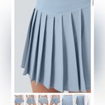 Halara  Women’s Breezeful High Waisted A Line 2-in-1 Pocket Pleated Mini Skirt XS Photo 2