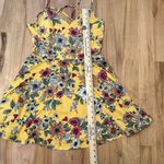 The General Good Yellow Floral Crisscross Spaghetti Strap Tank Dress Photo 9