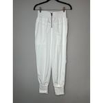 Free People  White Nylon Front Zip Athleisure Jogger Style Track Pants Size XS Photo 2