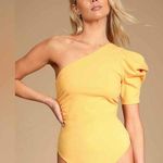 Free People  Somethin Bout You Yellow Puff Sleeve One-Shoulder Bodysuit Size XS Photo 0