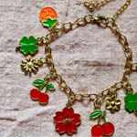 Gold Charm Bracelet with Colorful cherries Enamel Charms Photo 1