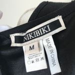 NIKIBIKI NWOT Cheetah Print Color Block Dress Photo 7