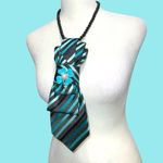 “Dainty Dapper” black necktie necklace with aqua stripes. Aqua flower brooch Photo 5