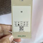 Halara  Play It My Way Athleisure Top Women NWT Md Grey High Low Hem Keyhole Back Photo 3