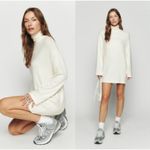 Reformation  Aspen Stretch  Turtleneck Mini Dress In Cream Photo 1