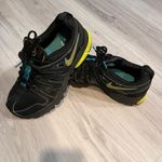 Nike women Black and Yellow Athletic Sneakers Photo 1