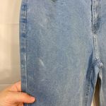 EUC Women’s medium/light wash blue stretch flare leg distressed‎ hem jeans XL Photo 4