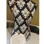 Round Wicker Star Bag with Floral Interior Photo 0