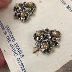 Vintage clip Brookcraft earrings new on card. Silver Photo 2