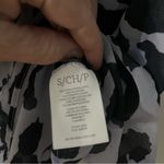 CAbi Print Purple and Black Beautiful Top. Elevate your style! Size Small Photo 6