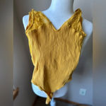 Bodysuit size small​​​ Gold Photo 2
