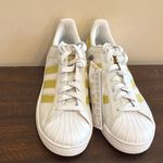 Adidas  Superstar White with Gold Stripes Photo 1