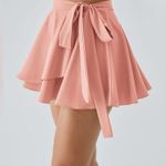 Halara  Skirt High Waisted Breezeful Tie Side 2in1 Side Pocket Mini Peach XS NWT Photo 2